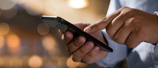 A man using his smartphone.