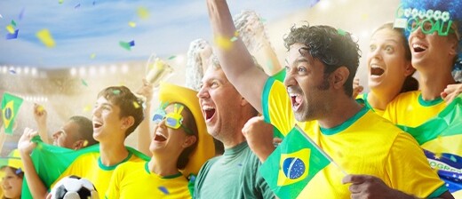 Passional football fans with Brazilian flags and colours.