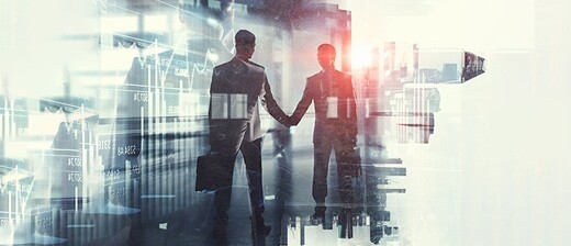 Two man shaking hands on a deal.